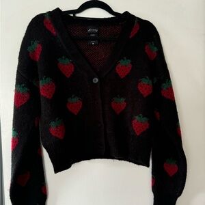 Fuzzy strawberry cropped cardigan size medium.